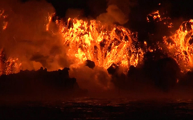Amazing Nighttime Footage of Wolf Volcano Spewing Lava into Sea (Video)
