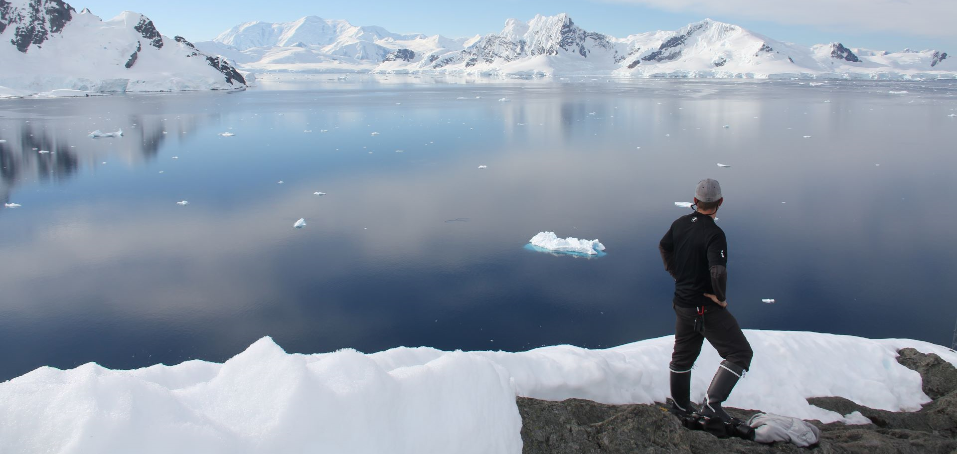 Man standing on the ice in the Arctic