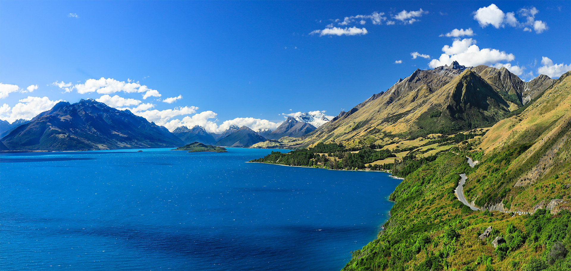 Panorma stunning scenic drive to Glenorchy along Lake Wakatipu with Southern Alps at Bennetts Bluff Lookout near Queenstown, South Island, New Zealand