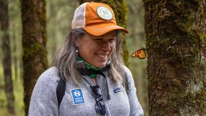 woman traveler monarch butterfly migration mexico
