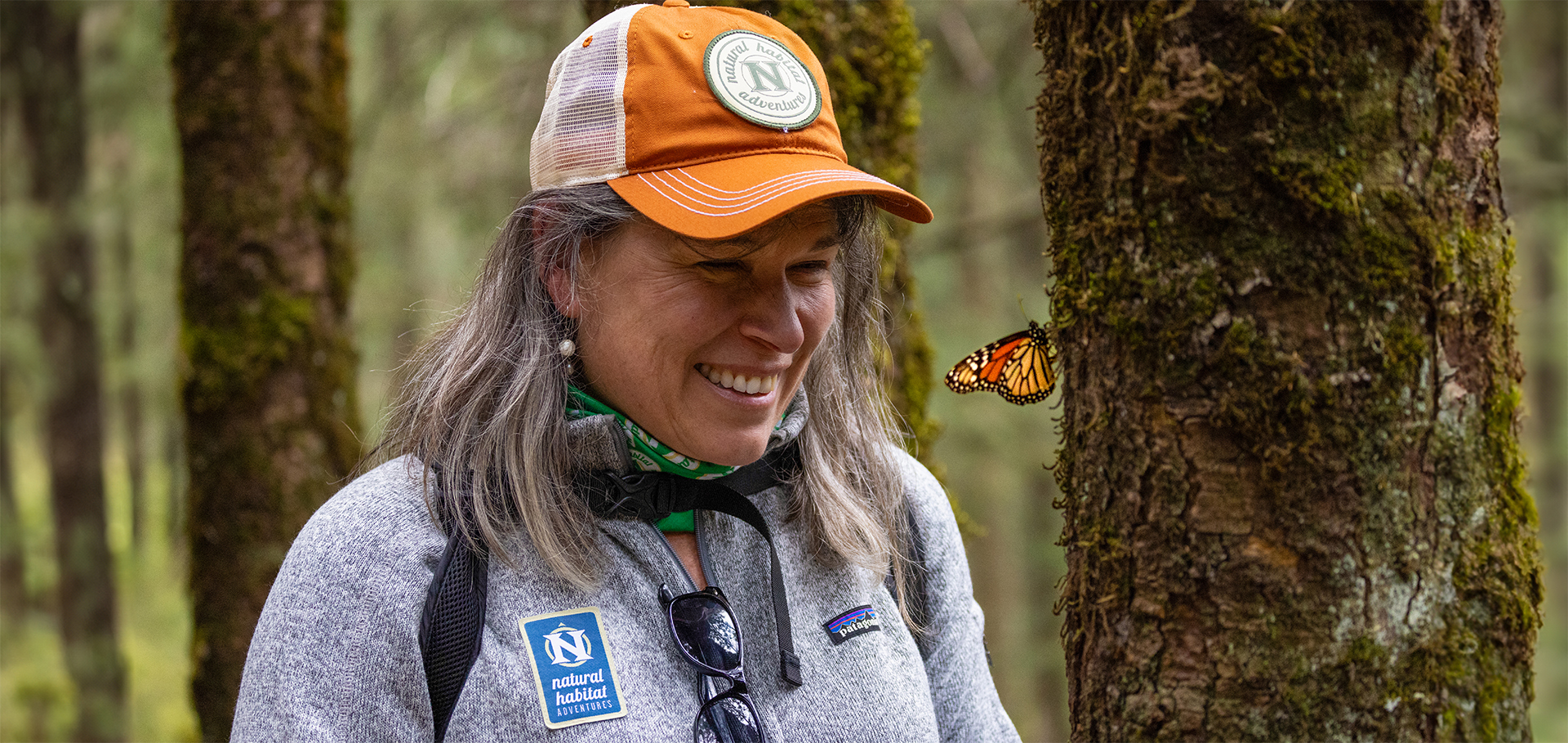 Natural Habitat Adventures guest observes monarch butterfly migration in Mexico sustainable tourism women in travel women empowered women in the wild adventures