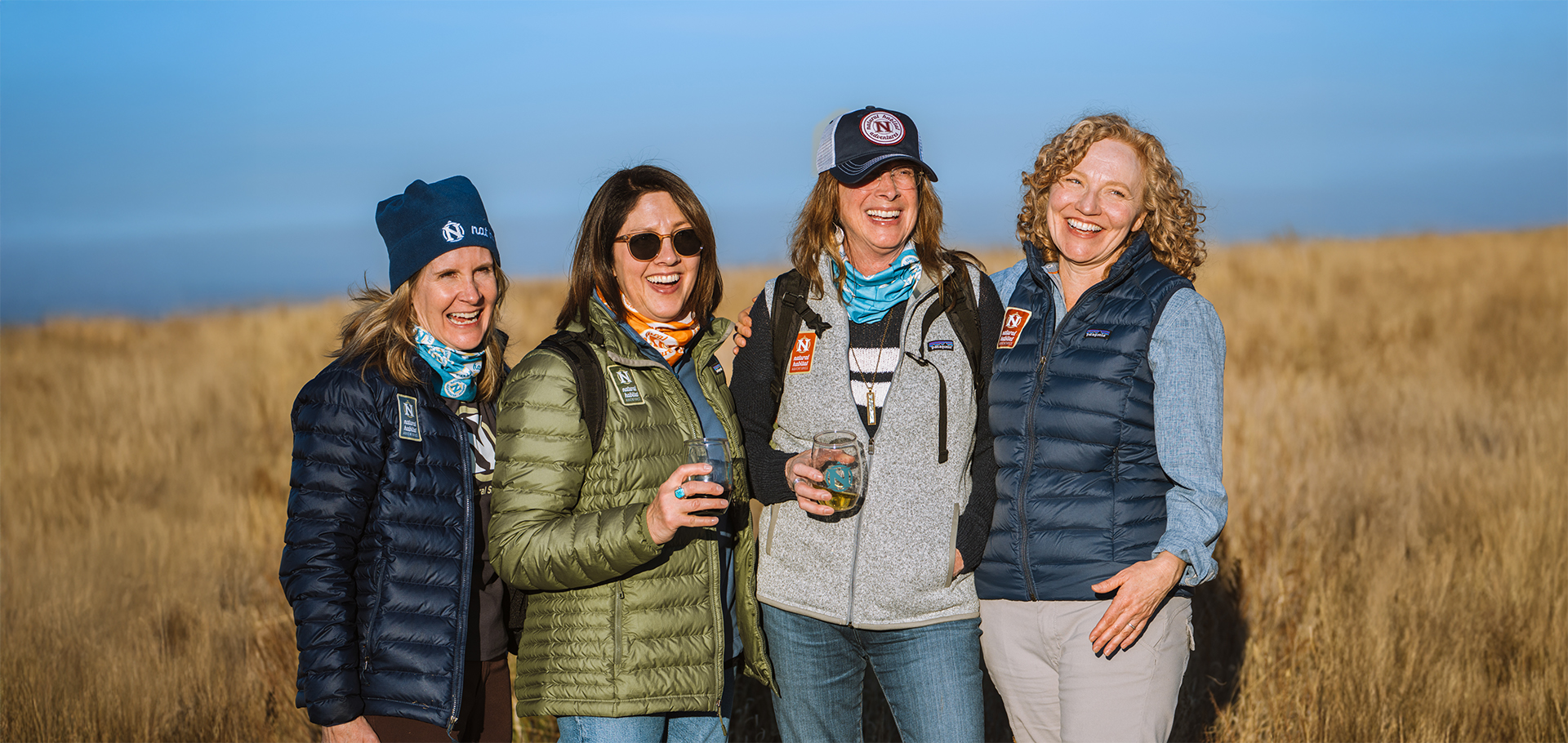 smiling travelers female women travel safari africa