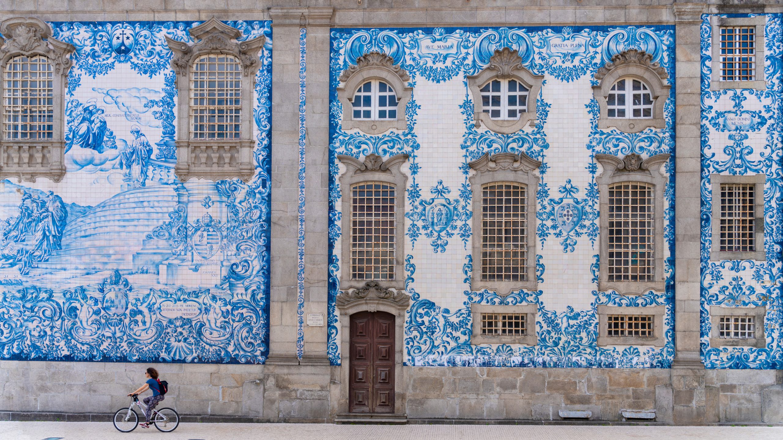 wall of the Carmo church decorated with hand painted tiles from the 19th century in Oporto, Portugal