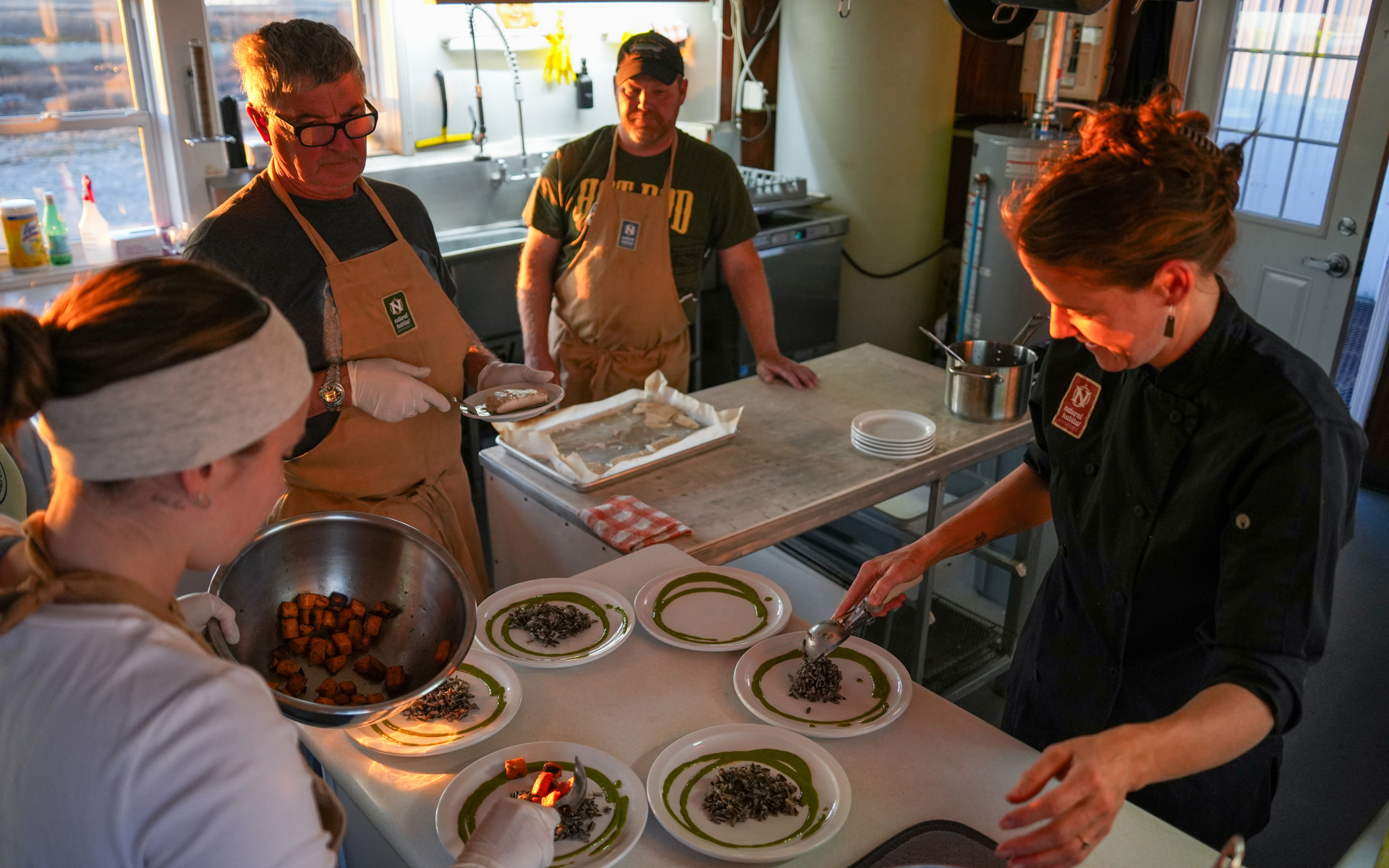 Chefs making magic at Nat Hab's Tundra Lodge in Churchill, Manitoba. Chef, cooking, base camp, Greenland, Churchill, Canada, expedition, travel, food