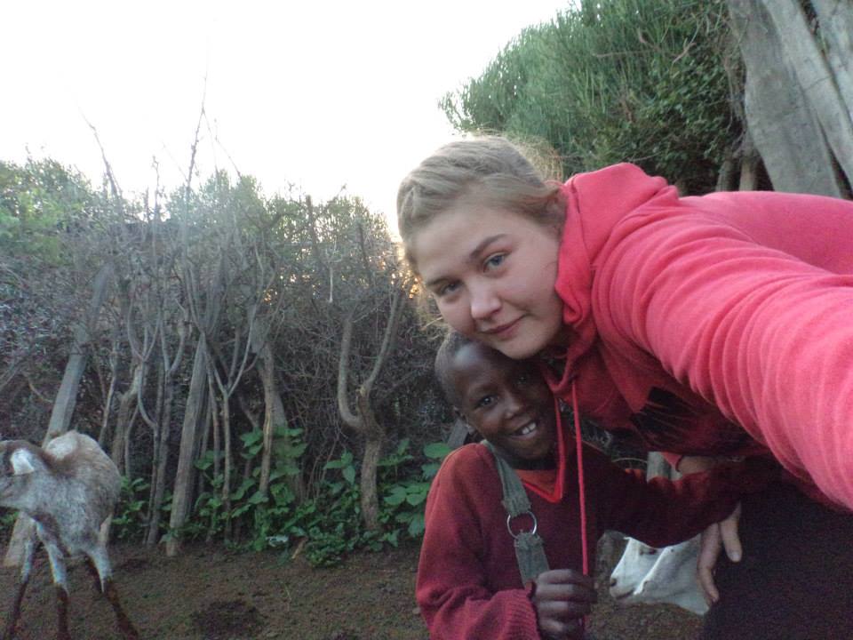teenage girl and child from local community in Kenya, East Africa