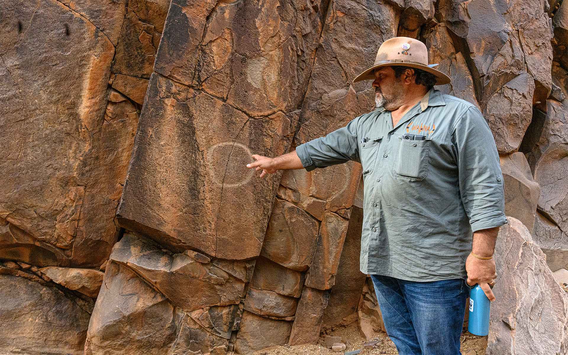Indigenous guide, australian outback, rock formations, rock paintings
